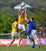 23 April 2022; Marc Jordan of Antrim in action against Conor Brady of Cavan during the Ulster GAA Football Senior Championship Quarter-Final match between Antrim and Cavan at Corrigan Park in Belfast. Photo by Ramsey Cardy/Sportsfile