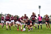 23 April 2022; Caroline Aherne of Tullamore RFC scores a try despite Katie O’Brien of Tullow RFC during the Paul Flood Cup Final match between BTullamore RFC and Tullow RFC at Ollie Campbell Park, Old Belvedere RFC in Dublin. Photo by Ben McShane/Sportsfile