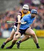 23 April 2022; Conor Burke of Dublin in action against Rory O'Connor of Wexford during the Leinster GAA Hurling Senior Championship Round 2 match between Wexford and Dublin at Chadwicks Wexford Park in Wexford. Photo by Eóin Noonan/Sportsfile