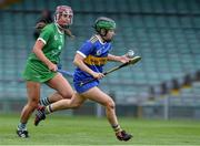 23 April 2022; Roisín Howard of Tipperary in action against Muireann Creamer of Limerick during the Munster Senior Camogie Championship Quarter-Final match between Tipperary and Limerick at TUS Gaelic Grounds in Limerick. Photo by Ray McManus/Sportsfile