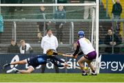 23 April 2022; Dublin goalkeeper Seán Brennan saves a penatly taken by Wexford goalkeeper Mark Fanning during the Leinster GAA Hurling Senior Championship Round 2 match between Wexford and Dublin at Chadwicks Wexford Park in Wexford. Photo by Eóin Noonan/Sportsfile