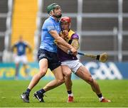 23 April 2022; Lee Chin of Wexford in action against Chris Crummey of Dublin during the Leinster GAA Hurling Senior Championship Round 2 match between Wexford and Dublin at Chadwicks Wexford Park in Wexford. Photo by Eóin Noonan/Sportsfile