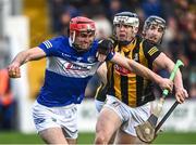 23 April 2022; Jack Kelly of Laois in action against TJ Reid of Kilkenny during the Leinster GAA Hurling Senior Championship Round 2 match between Kilkenny and Laois at UPMC Nowlan Park in Kilkenny. Photo by David Fitzgerald/Sportsfile