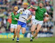 23 April 2022; Jack Prendergast of Waterford is tackled by William O'Donoghue of Limerick during the Munster GAA Hurling Senior Championship Round 2 match between Limerick and Waterford at TUS Gaelic Grounds in Limerick. Photo by Ray McManus/Sportsfile