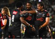 23 April 2022; Sikhumbuzo Notshe, centre, and Phepsi Buthelezi of Cell C Sharks embrace after their side's victory in the United Rugby Championship match between Cell C Sharks and Leinster at Hollywoodbets Kings Park Stadium in Durban, South Africa. Photo by Harry Murphy/Sportsfile