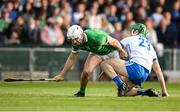 23 April 2022; Aaron Gillane of Limerick in action against Tom Barron of Waterford during the Munster GAA Hurling Senior Championship Round 2 match between Limerick and Waterford at TUS Gaelic Grounds in Limerick. Photo by Stephen McCarthy/Sportsfile
