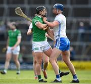 23 April 2022; Conor Prunty of Waterford and Darragh O'Donovan of Limerick tussle during the Munster GAA Hurling Senior Championship Round 2 match between Limerick and Waterford at TUS Gaelic Grounds in Limerick. Photo by Stephen McCarthy/Sportsfile