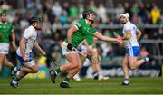 23 April 2022; Darragh O'Donovan of Limerick is tackled by Darragh Lyons of Waterford during the Munster GAA Hurling Senior Championship Round 2 match between Limerick and Waterford at TUS Gaelic Grounds in Limerick. Photo by Ray McManus/Sportsfile
