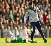23 April 2022; Cian Lynch of Limerick receives medical attention from chartered Physiotherapist Mark Melbourne during the Munster GAA Hurling Senior Championship Round 2 match between Limerick and Waterford at TUS Gaelic Grounds in Limerick. Photo by Stephen McCarthy/Sportsfile