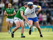 23 April 2022; Stephen Bennett of Waterford in action against Darragh O'Donovan of Limerick during the Munster GAA Hurling Senior Championship Round 2 match between Limerick and Waterford at TUS Gaelic Grounds in Limerick. Photo by Stephen McCarthy/Sportsfile