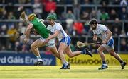 23 April 2022; Dan Morrisey of Limerick is tackled by Michael Kiely of Waterford during the Munster GAA Hurling Senior Championship Round 2 match between Limerick and Waterford at TUS Gaelic Grounds in Limerick. Photo by Stephen McCarthy/Sportsfile