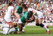 24 April 2022; Linda Djougang of Ireland is held up by Emily Scarratt of England during the TikTok Women's Six Nations Rugby Championship match between England and Ireland at Mattioli Woods Welford Road Stadium in Leicester, England. Photo by Darren Staples/Sportsfile
