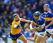 24 April 2022; Jason Forde of Tipperary is tackled by Rory Hayes of Clare during the Munster GAA Hurling Senior Championship Round 2 match between Tipperary and Clare at FBD Semple Stadium in Thurles, Tipperary. Photo by Ray McManus/Sportsfile