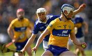 24 April 2022; Diarmuid Ryan of Clare is tackled by Ger Browne of Tipperary during the Munster GAA Hurling Senior Championship Round 2 match between Tipperary and Clare at FBD Semple Stadium in Thurles, Tipperary. Photo by Ray McManus/Sportsfile
