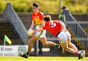 24 April 2022; Niall Hickey of Carlow in action against Bevan Duffy of Louth during the Leinster GAA Football Senior Championship Round 1 match between Louth and Carlow at Páirc Tailteann in Navan, Meath. Photo by Eóin Noonan/Sportsfile