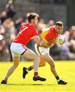 24 April 2022; Darragh Foley of Carlow in action against John Clutterbuck of Louth during the Leinster GAA Football Senior Championship Round 1 match between Louth and Carlow at Páirc Tailteann in Navan, Meath. Photo by Eóin Noonan/Sportsfile