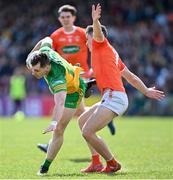 24 April 2022; Jamie Brennan of Donegal in action against Jarly Óg Burns of Armagh during the Ulster GAA Football Senior Championship Quarter-Final match between Donegal and Armagh at Páirc MacCumhaill in Ballybofey, Donegal. Photo by Ramsey Cardy/Sportsfile
