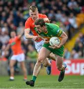 24 April 2022; Hugh McFadden of Donegal in action against Rian O'Neill of Armagh during the Ulster GAA Football Senior Championship Quarter-Final match between Donegal and Armagh at Páirc MacCumhaill in Ballybofey, Donegal. Photo by Ramsey Cardy/Sportsfile