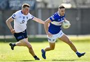 24 April 2022; Patrick O’Sullivan of Laois in action against Rory Stokes of Wicklow during the Leinster GAA Football Senior Championship Round 1 match between Wicklow and Laois at the County Grounds in Aughrim, Wicklow. Photo by Seb Daly/Sportsfile