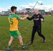 24 April 2022; Donegal manager Declan Bonner, right, and Ryan McHugh of Donegal after their victory in the Ulster GAA Football Senior Championship Quarter-Final match between Donegal and Armagh at Páirc MacCumhaill in Ballybofey, Donegal. Photo by Ramsey Cardy/Sportsfile