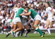 24 April 2022; Sene Naoupu and Dorothy Wall of Ireland tackle Jess Breach of England during the TikTok Women's Six Nations Rugby Championship match between England and Ireland at Mattioli Woods Welford Road Stadium in Leicester, England. Photo by Darren Staples/Sportsfile