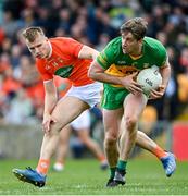 24 April 2022; Hugh McFadden of Donegal in action against Rian O'Neill of Armagh during the Ulster GAA Football Senior Championship Quarter-Final match between Donegal and Armagh at Páirc MacCumhaill in Ballybofey, Donegal. Photo by Ramsey Cardy/Sportsfile