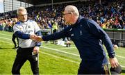 24 April 2022; Tipperary manager Colm Bonnar and Clare manager Brian Lohan shake hands after the Munster GAA Hurling Senior Championship Round 2 match between Tipperary and Clare at FBD Semple Stadium in Thurles, Tipperary. Photo by Ray McManus/Sportsfile