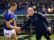 24 April 2022; Clare manager Brian Lohan shakes hands with Barry Heffernan  of Tipperary after the Munster GAA Hurling Senior Championship Round 2 match between Tipperary and Clare at FBD Semple Stadium in Thurles, Tipperary. Photo by Ray McManus/Sportsfile