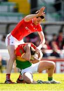 24 April 2022; Colm Hulton of Carlow is tackled by Tommy Durnin of Louth during the Leinster GAA Football Senior Championship Round 1 match between Louth and Carlow at Páirc Tailteann in Navan, Meath. Photo by Eóin Noonan/Sportsfile