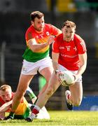 24 April 2022; Sam Mulroy of Louth in action against Eoghan Ruth of Carlow during the Leinster GAA Football Senior Championship Round 1 match between Louth and Carlow at Páirc Tailteann in Navan, Meath. Photo by Eóin Noonan/Sportsfile