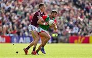 24 April 2022; Aidan O’Shea of Mayo is tackled by Niall Daly of Galway during the Connacht GAA Football Senior Championship Quarter-Final match between Mayo and Galway at Hastings Insurance MacHale Park in Castlebar, Mayo. Photo by Brendan Moran/Sportsfile