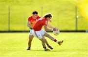 24 April 2022; Gerard Browne of Louth is tackled by Jamie Clarke of Carlow during the Leinster GAA Football Senior Championship Round 1 match between Louth and Carlow at Páirc Tailteann in Navan, Meath. Photo by Eóin Noonan/Sportsfile