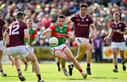 24 April 2022; Jason Doherty of Mayo in action against Johnny Heaney and Seán Kelly of Galway during the Connacht GAA Football Senior Championship Quarter-Final match between Mayo and Galway at Hastings Insurance MacHale Park in Castlebar, Mayo. Photo by Brendan Moran/Sportsfile