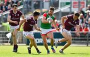 24 April 2022; Aidan O’Shea of Mayo in action against Galway players Matthew Tierney, Seán Kelly and Paul Conroy during the Connacht GAA Football Senior Championship Quarter-Final match between Mayo and Galway at Hastings Insurance MacHale Park in Castlebar, Mayo. Photo by Brendan Moran/Sportsfile