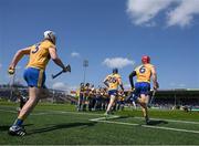 24 April 2022; Clare players, from left, Conor Cleary, Shane O'Donnell and John Conlon run out from the dressingrooms before the Munster GAA Hurling Senior Championship Round 2 match between Tipperary and Clare at FBD Semple Stadium in Thurles, Tipperary. Photo by Ray McManus/Sportsfile