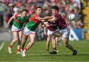 24 April 2022; Jason Doherty of Mayo in action against Sean Kelly of Galway during the Connacht GAA Football Senior Championship Quarter-Final match between Mayo and Galway at Hastings Insurance MacHale Park in Castlebar, Mayo. Photo by Ray Ryan/Sportsfile