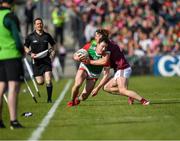 24 April 2022; Diarmuid O’Connor of Mayo in action against Kieran Molloy of Galway  during the Connacht GAA Football Senior Championship Quarter-Final match between Mayo and Galway at Hastings Insurance MacHale Park in Castlebar, Mayo. Photo by Ray Ryan/Sportsfile