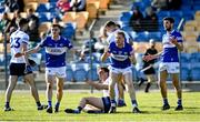 24 April 2022; Laois players, from left, Trevor Collins, Alan Farrell and Daniel O’Reilly reacts after a decision is given against their side during the Leinster GAA Football Senior Championship Round 1 match between Wicklow and Laois at the County Grounds in Aughrim, Wicklow. Photo by Seb Daly/Sportsfile