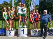 24 April 2022; Athletics Ireland president John Cronin with over 50 women's medallists, Raheny Shamrocks AC, Dublin, gold, Brother's Pearse AC, Dublin, silver and Lucan Harriers AC, Dublin, bronze, competing in the Irish Life Health AAI Road Relays in Raheny, Dublin. Photo by Sam Barnes/Sportsfile