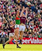 24 April 2022; John Daly, right, and Matthew Tierney of Galway contest a kickout with Aidan O’Shea of Mayo during the Connacht GAA Football Senior Championship Quarter-Final match between Mayo and Galway at Hastings Insurance MacHale Park in Castlebar, Mayo. Photo by Brendan Moran/Sportsfile