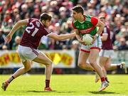 24 April 2022; Lee Keegan of Mayo in action against Patrick Kelly of Galway during the Connacht GAA Football Senior Championship Quarter-Final match between Mayo and Galway at Hastings Insurance MacHale Park in Castlebar, Mayo. Photo by Brendan Moran/Sportsfile