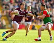 24 April 2022; Robert Finnerty of Galway in action against Michael Plunkett of Mayo during the Connacht GAA Football Senior Championship Quarter-Final match between Mayo and Galway at Hastings Insurance MacHale Park in Castlebar, Mayo. Photo by Brendan Moran/Sportsfile