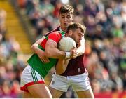 24 April 2022; Aidan O’Shea of Mayo is tackled by Matthew Tierney of Galway during the Connacht GAA Football Senior Championship Quarter-Final match between Mayo and Galway at Hastings Insurance MacHale Park in Castlebar, Mayo. Photo by Brendan Moran/Sportsfile