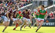 24 April 2022; Damien Comer of Galway races clear of Diarmuid O'Connor of Mayo during the Connacht GAA Football Senior Championship Quarter-Final match between Mayo and Galway at Hastings Insurance MacHale Park in Castlebar, Mayo. Photo by Brendan Moran/Sportsfile