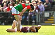 24 April 2022; Padraig O’Hora of Mayo and Damien Comer of Galway during the Connacht GAA Football Senior Championship Quarter-Final match between Mayo and Galway at Hastings Insurance MacHale Park in Castlebar, Mayo. Photo by Brendan Moran/Sportsfile