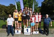 24 April 2022; Athletics Ireland president John Cronin, right, and Athletics Ireland Chair of Competition Andrew Lynam, left, with senior men's medallists, Clonliffe Harriers AC, Dublin, gold, UCD AC, Dublin, silver, and Ennis Track Club, Clare, bronze, competing in the Irish Life Health AAI Road Relays in Raheny, Dublin. Photo by Sam Barnes/Sportsfile