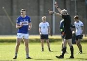 24 April 2022; Referee Fergal Kelly shows a black card to Evan O’Carroll of Laois during the Leinster GAA Football Senior Championship Round 1 match between Wicklow and Laois at the County Grounds in Aughrim, Wicklow. Photo by Seb Daly/Sportsfile