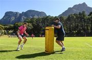 25 April 2022; Lee Barron with contact skills coach Denis Leamy during a Leinster rugby squad training session at Westerford High School in Cape Town, South Africa. Photo by Harry Murphy/Sportsfile