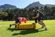 25 April 2022; Thomas Clarkson with contact skills coach Denis Leamy during a Leinster rugby squad training session at Westerford High School in Cape Town, South Africa. Photo by Harry Murphy/Sportsfile