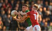25 April 2022; Thomas O'Donnell of Kerry in action against Richard O'Sullivan of Cork during the EirGrid Munster GAA Football Under 20 Championship final match between Kerry and Cork at Austin Stack Park in Tralee, Kerry. Photo by Eóin Noonan/Sportsfile